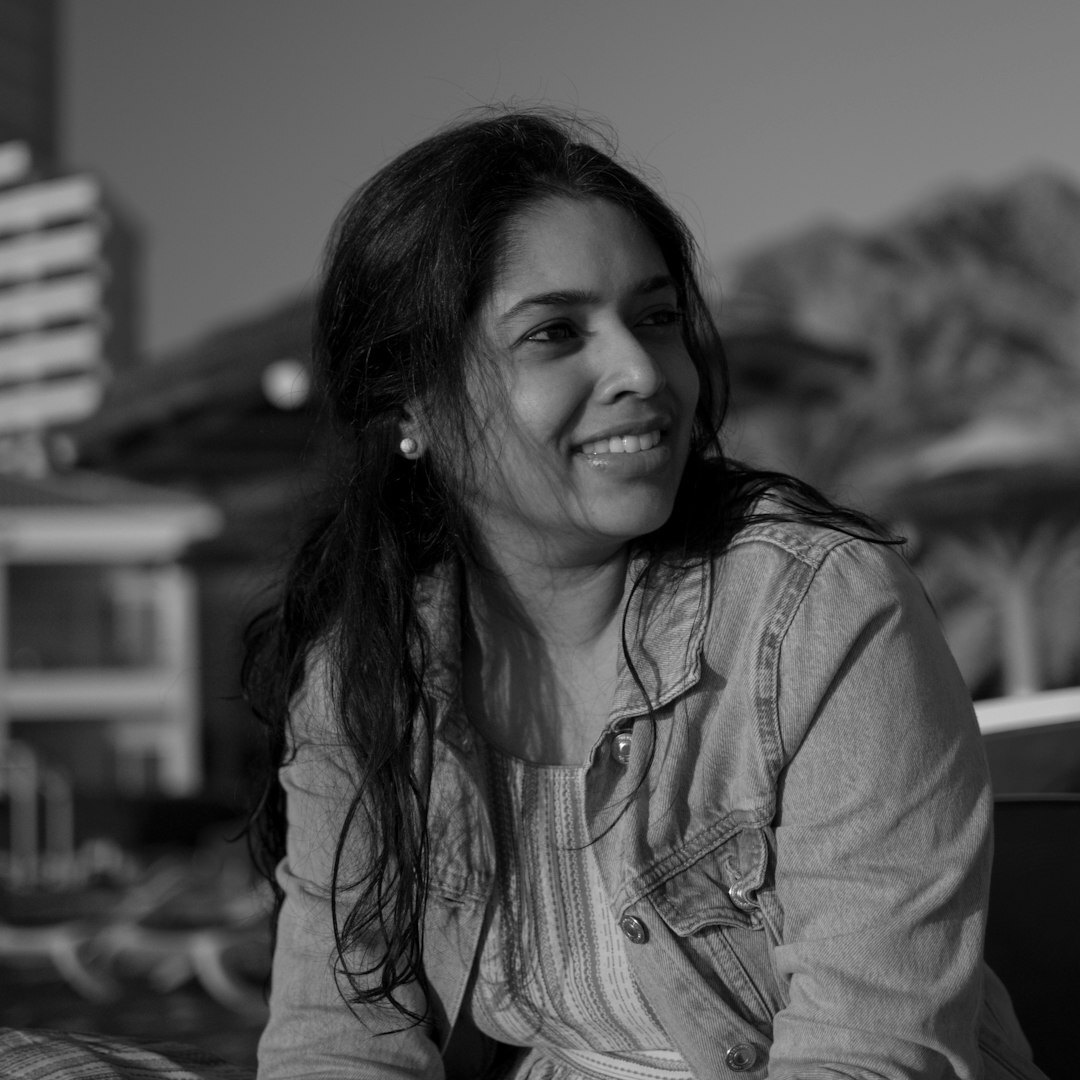 Professional female tech journalist smiling