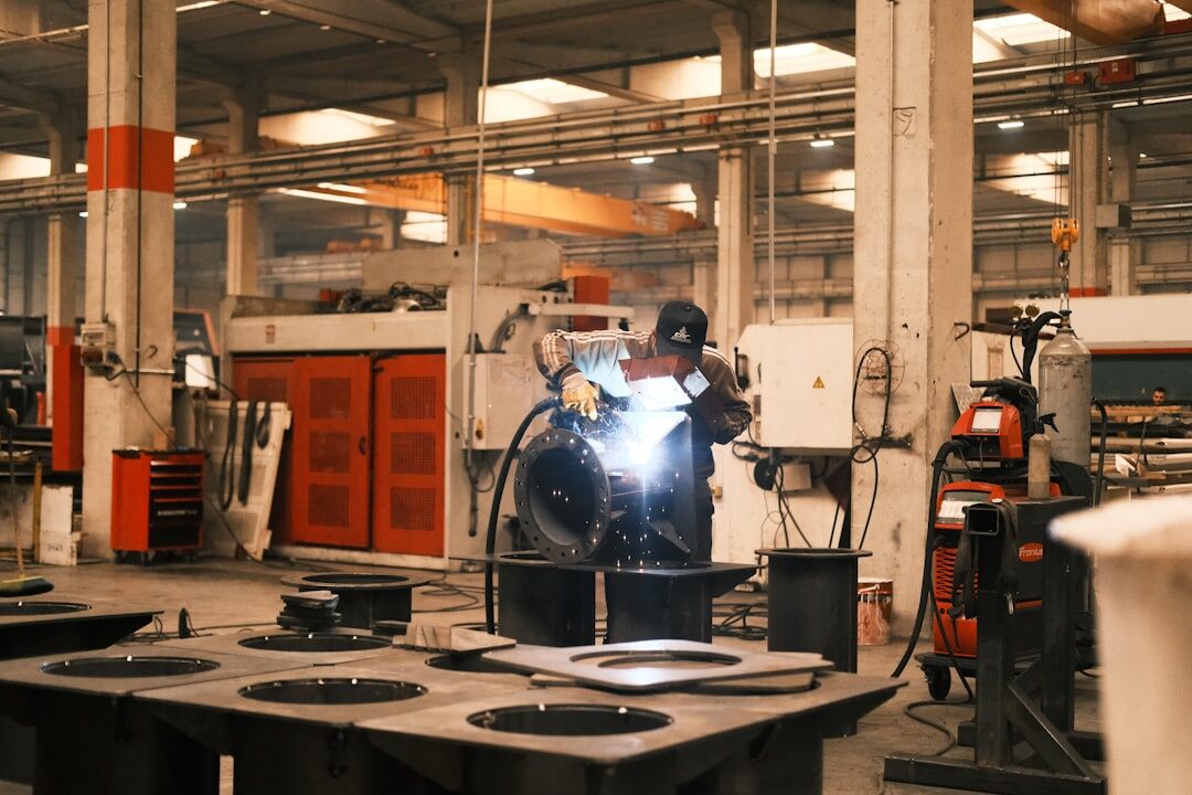 Industrial robot arm in factory